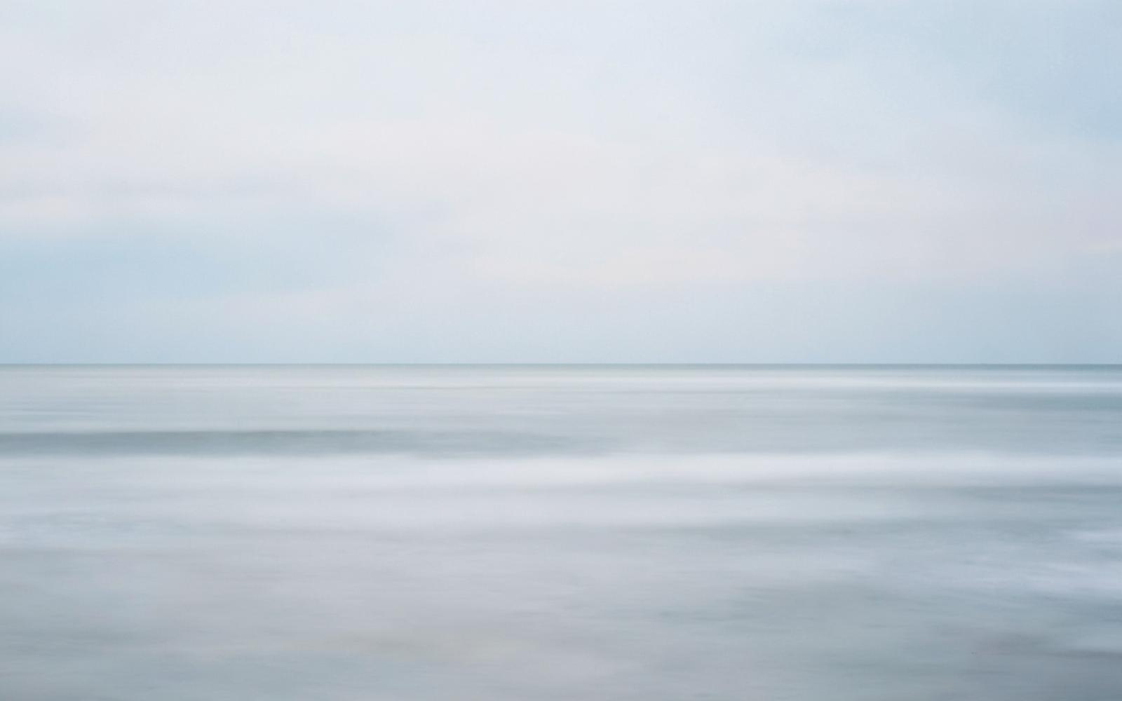 Quiet ocean horizon under soft grey light off Vancouver Island